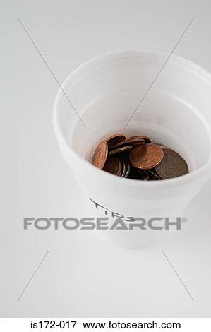 Stock Photo - Tips in a plastic cup. Fotosearch