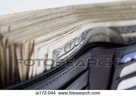 Picture - Wallet full of money. Fotosearch