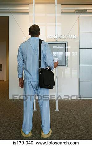 Businessman arriving at work in pajamas View Large Photo Image Stock Image - Businessman arriving at work in pajamas. Fotosearch