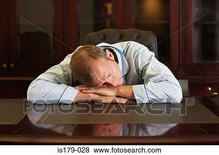 Businessman asleep at his desk View Large Photo Image Stock Photo - Businessman asleep at his desk. Fotosearch