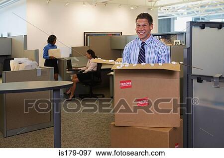 Businessman in cardboard box View Large Photo Image Stock Photo - Businessman in cardboard box. Fotosearch