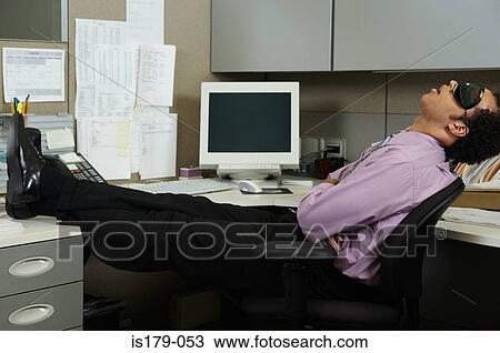 Businessman sleeping at his desk View Large Photo Image Stock Image - Businessman sleeping at his desk. Fotosearch