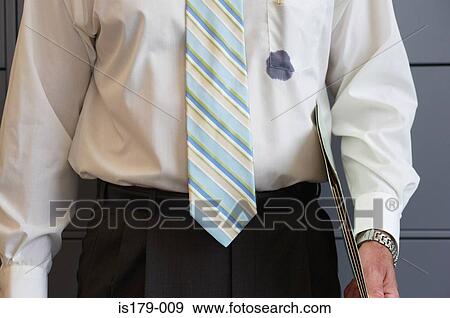 Businessman with an ink stained shirt View Large Photo Image Stock Photo - Businessman with an ink stained shirt. Fotosearch