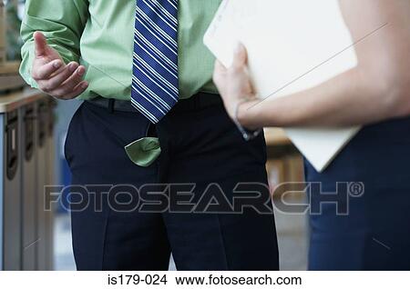 Businessman with his trouser zip undone View Large Photo Image Picture - Businessman with his trouser zip undone. Fotosearch