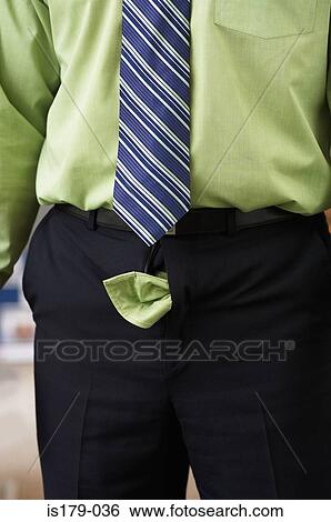 Stock Photograph - Businessman with his trouser zip undone. Fotosearch