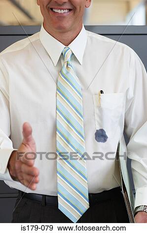 Businessman with ink stain on his shirt View Large Photo Image Stock Photo - Businessman with ink stain on his shirt. Fotosearch