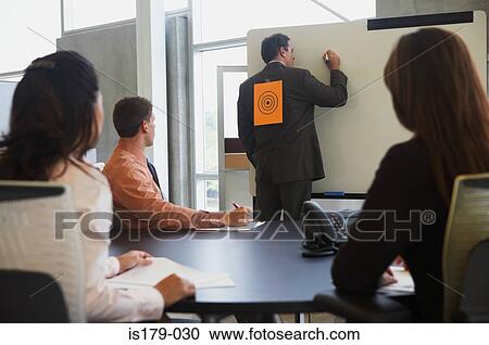 Businessman with sign on his back View Large Photo Image Stock Image - Businessman with sign on his back. Fotosearch