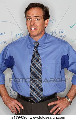 Businessman with sweaty underarms View Large Photo Image Stock Photograph - Businessman with sweaty underarms. Fotosearch
