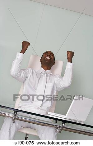 Stock Photography - Overjoyed businessman. Fotosearch