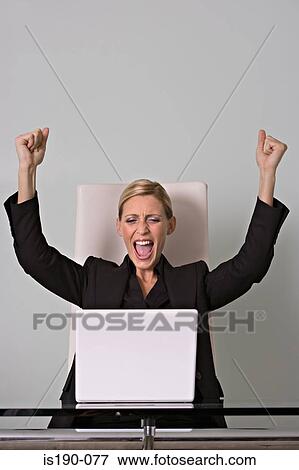Overjoyed businesswoman View Large Photo Image Stock Photo - Overjoyed businesswoman. Fotosearch