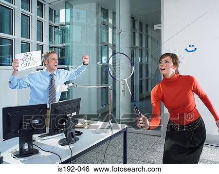 Office worker playing badminton View Large Photo Image Stock Photograph - Office worker playing badminton. Fotosearch
