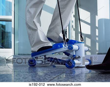 Person using step machine View Large Photo Image Stock Image - Person using step machine. Fotosearch