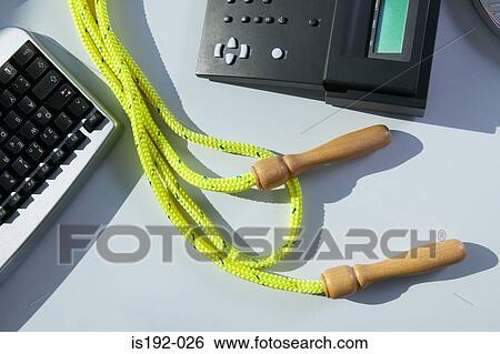 Skipping rope on a desk View Large Photo Image Stock Photograph - Skipping rope on a desk. Fotosearch