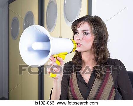 Woman using megaphone View Large Photo Image Stock Image - Woman using megaphone. Fotosearch