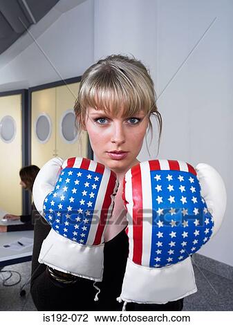 Woman wearing boxing gloves View Large Photo Image Stock Image - Woman wearing boxing gloves. Fotosearch