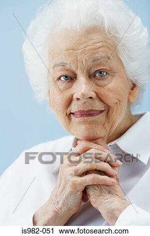 Stock Image - Portrait of senior woman. Fotosearch