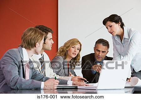 Businesspeople discussing ideas View Large Photo Image Stock Image - Businesspeople discussing ideas. Fotosearch