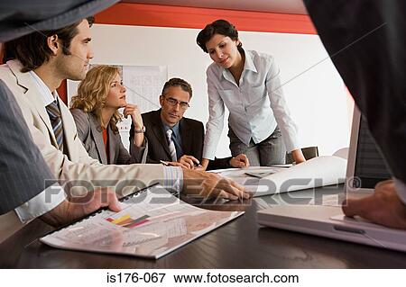 Businesspeople in meeting View Large Photo Image Stock Photo - Businesspeople in meeting. Fotosearch