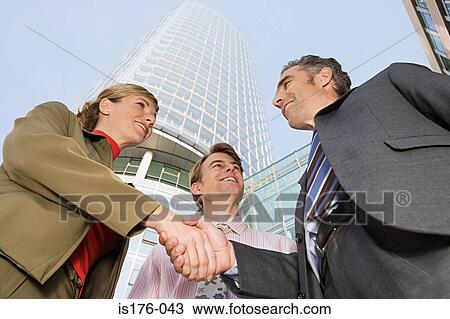Businesspeople shaking hands View Large Photo Image Stock Image - Businesspeople shaking hands. Fotosearch