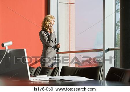 Businesswoman on mobile View Large Photo Image Stock Image - Businesswoman on mobile. Fotosearch