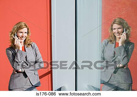 Businesswoman on mobile View Large Photo Image Stock Photograph - Businesswoman on mobile. Fotosearch