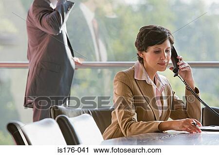 Businesswoman on telephone View Large Photo Image Stock Image - Businesswoman on telephone. Fotosearch