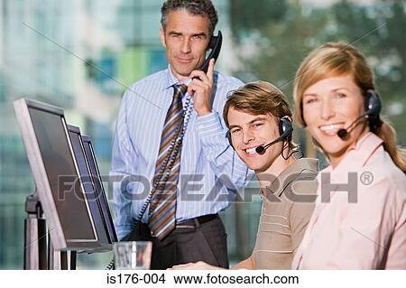 Picture - Call centre workers. Fotosearch