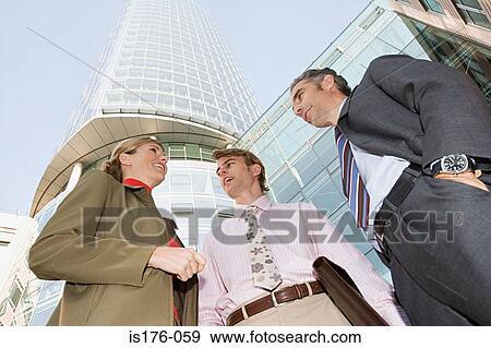 Colleagues outside office View Large Photo Image Stock Photo - Colleagues outside office. Fotosearch