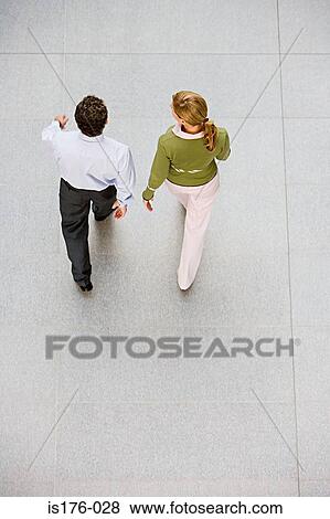Stock Photo - Colleagues taking a walk. Fotosearch