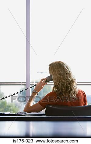 Stock Image - Woman on the telephone. Fotosearch