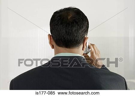 Businessman on cell phone View Large Photo Image Stock Photography - Businessman on cell phone. Fotosearch
