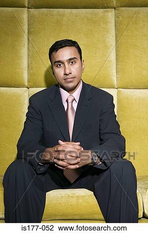 Businessman on sofa View Large Photo Image Stock Image - Businessman on sofa. Fotosearch