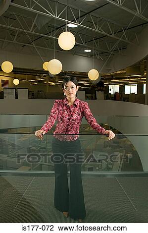 Businesswoman in office View Large Photo Image Stock Image - Businesswoman in office. Fotosearch
