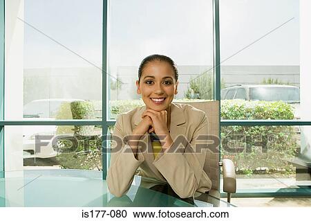 Businesswoman in office View Large Photo Image Stock Image - Businesswoman in office. Fotosearch
