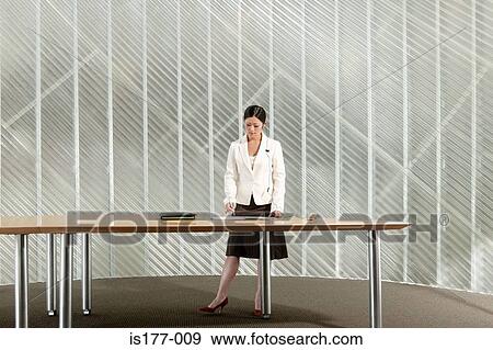 PA standing at table View Large Photo Image Stock Photo - PA standing at table. Fotosearch