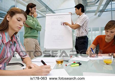 Colleagues brainstorming View Large Photo Image Stock Image - Colleagues brainstorming. Fotosearch