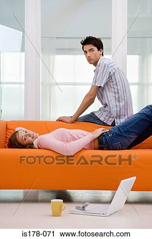 Colleagues on a sofa View Large Photo Image Stock Image - Colleagues on a sofa. Fotosearch