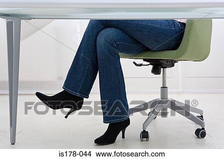 Legs Of A Woman Under Desk Picture Is178 044 Fotosearch Legs Of A Woman Under Desk