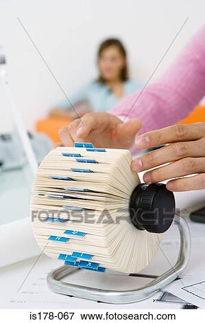 Looking through card file View Large Photo Image Stock Photo - Looking through card file. Fotosearch
