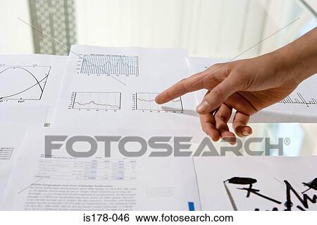Woman pointing to graph View Large Photo Image Stock Photograph - Woman pointing to graph. Fotosearch