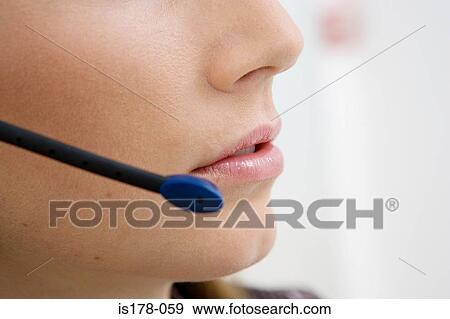 Woman with headset microphone View Large Photo Image Stock Photo - Woman with headset microphone. Fotosearch