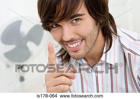 Young man with an idea View Large Photo Image Picture - Young man with an idea. Fotosearch