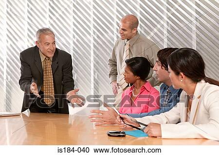 Stock Image - Businessman explaining idea. Fotosearch