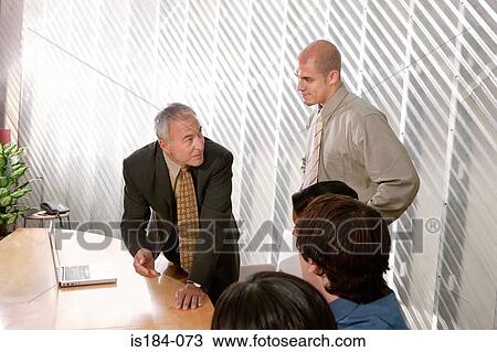 Businessman explaining idea View Large Photo Image Stock Image - Businessman explaining idea. Fotosearch