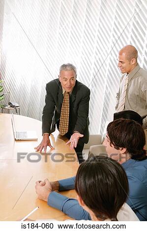 Businessman in discussion View Large Photo Image Stock Image - Businessman in discussion. Fotosearch