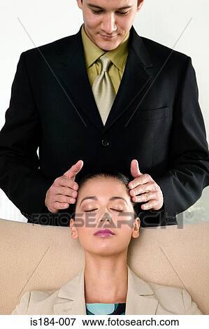 Businessman massaging businesswoman View Large Photo Image Stock Photo - Businessman massaging businesswoman. Fotosearch