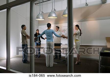 Colleagues holding hands View Large Photo Image Stock Photography - Colleagues holding hands. Fotosearch