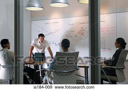 Colleagues in a meeting View Large Photo Image Stock Photo - Colleagues in a meeting. Fotosearch
