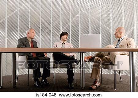 Serious looking businessmen View Large Photo Image Stock Photograph - Serious looking businessmen. Fotosearch