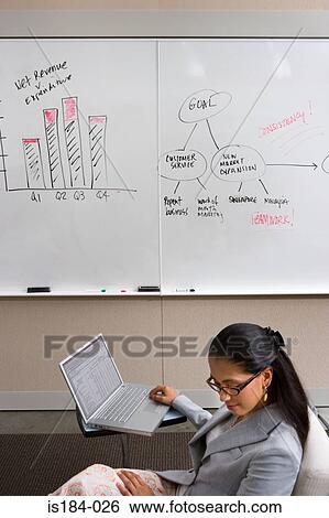 Woman in presentation View Large Photo Image Stock Photograph - Woman in presentation. Fotosearch